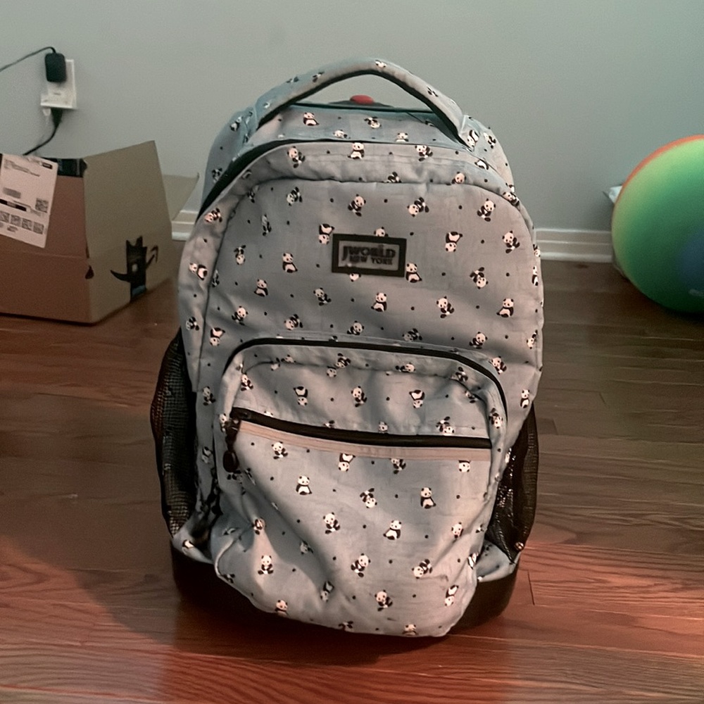 Jworld New York blue panda printed roller backpack.